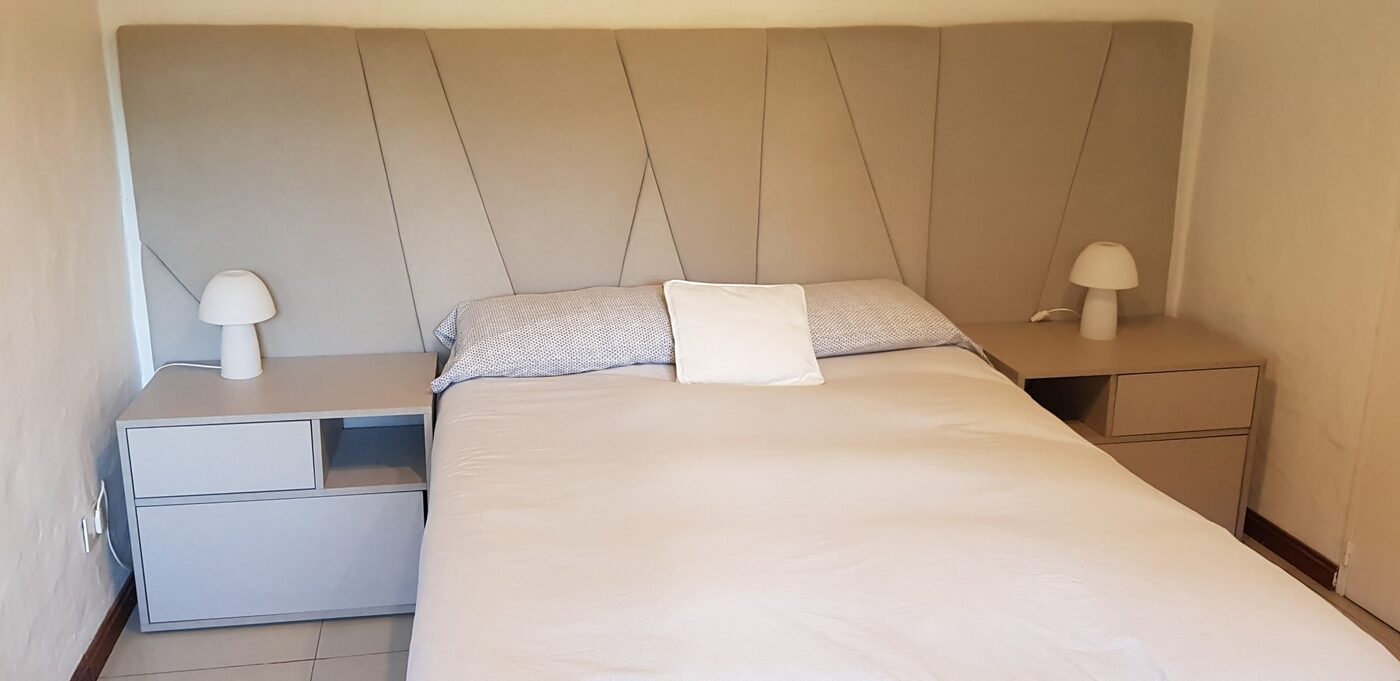 Living integrado con mobiliario a medida